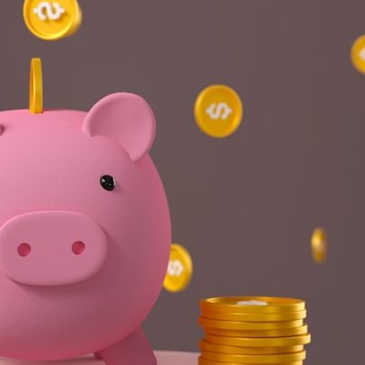 Pink piggy bank saving golden crypto USD coins financial growth